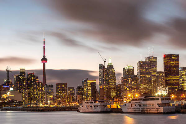 Pier in a light up city during sunset in Toronto Canada - Art Print